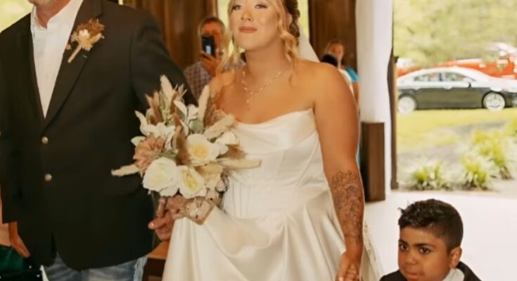 I walked down the aisle holding two hands, but no one could have imagined the secret linking my past and