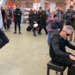 A 76-year-old man participates in a piano battle at the mall
